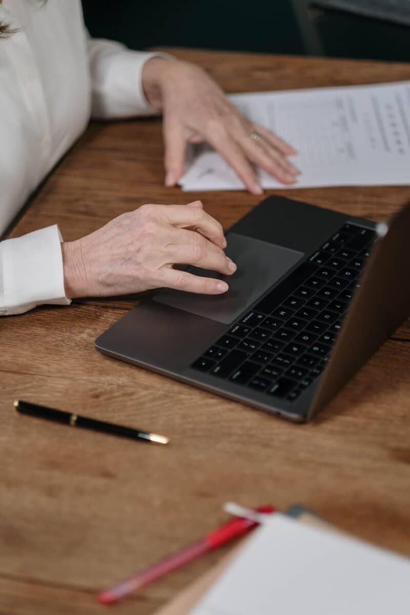 A person using a laptop.