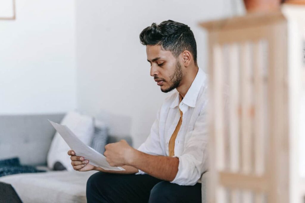 A person reading a paper.