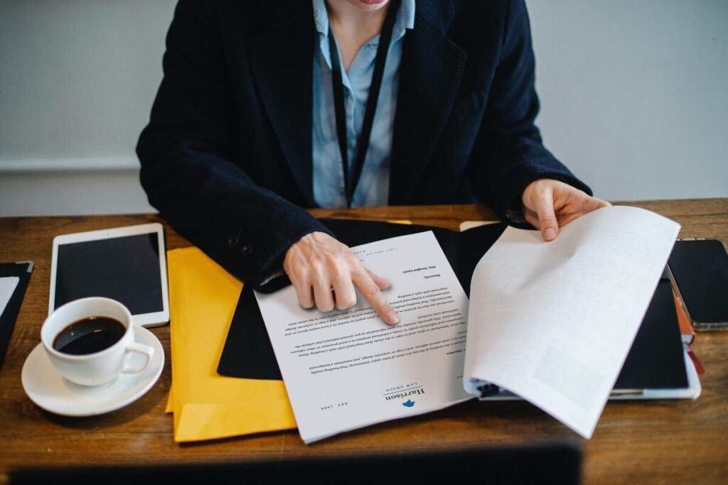 A person reading a document.